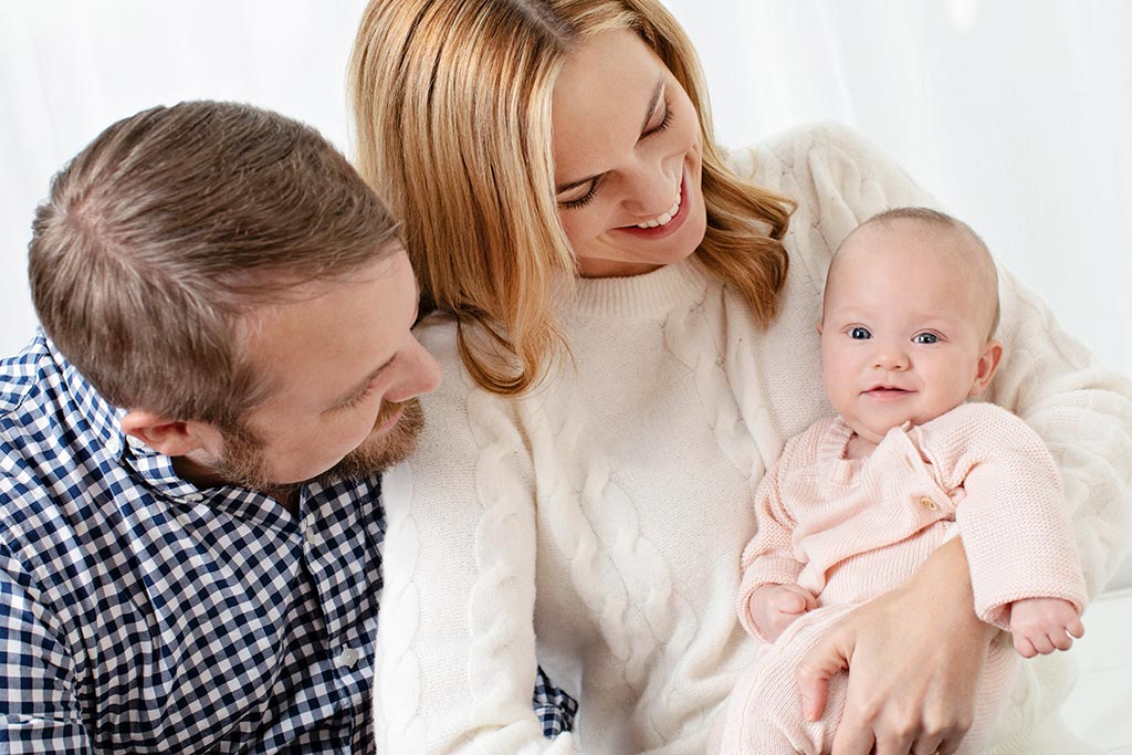 six-month session for cutest little girl and parents in private studio