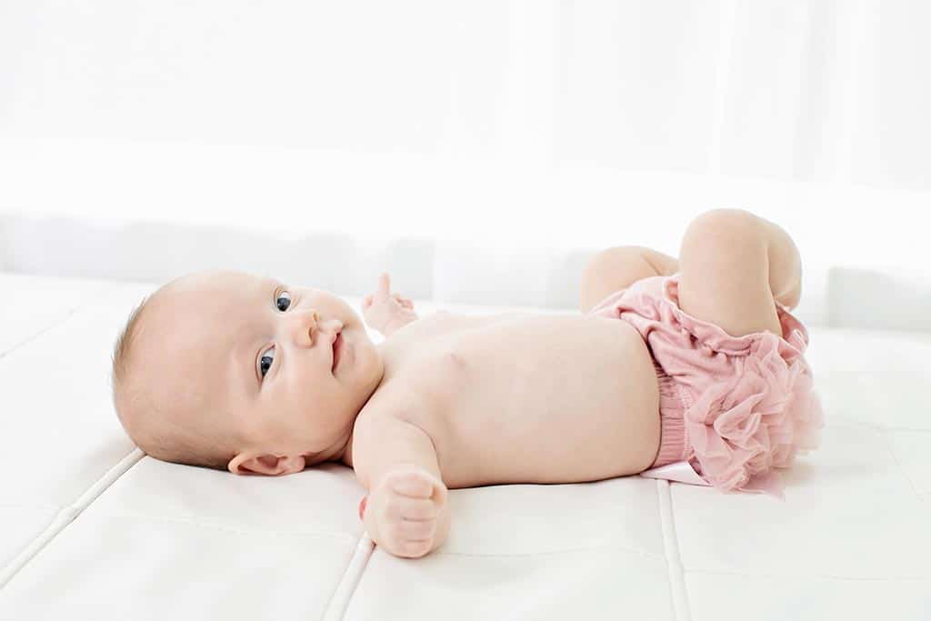 six-month session for cutest little girl and parents in private studio