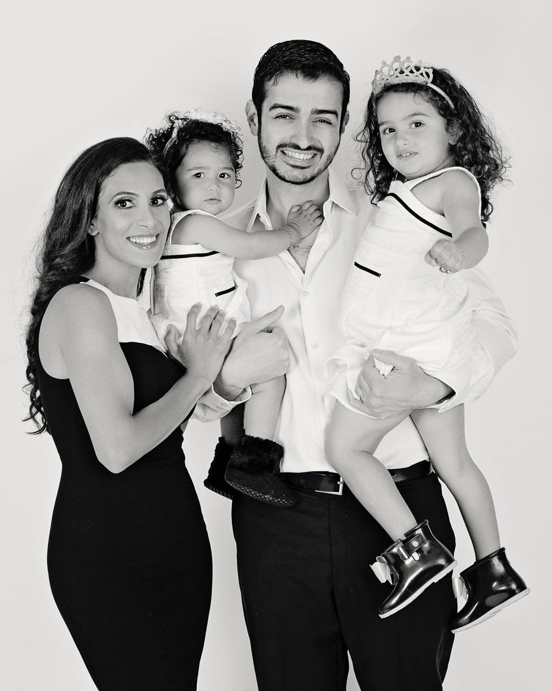 black and white photo of beautiful family