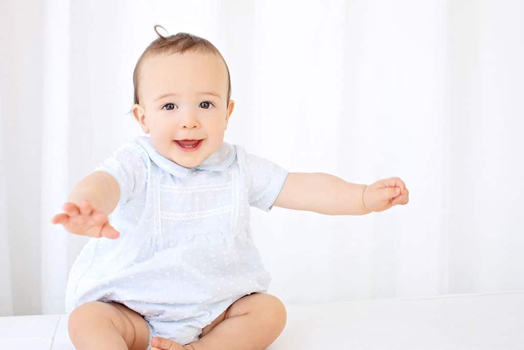 gorgeous photos of the liveliest six-month-old ever in private dallas studio session