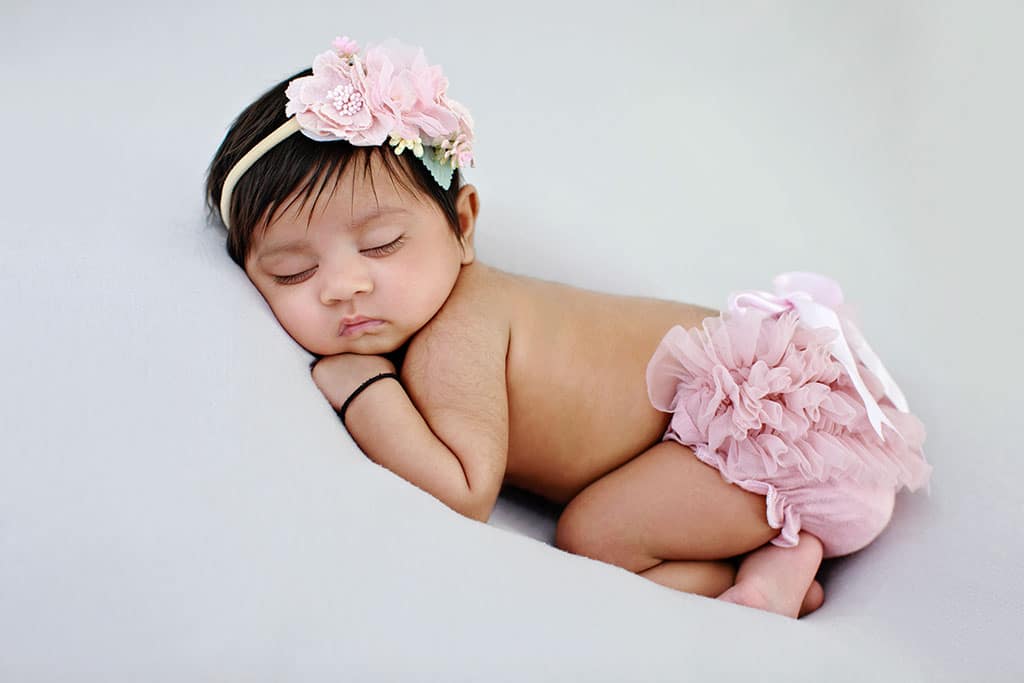 beautiful baby girl celebrating her first few months of life in private studio session