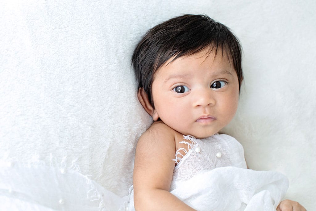 beautiful baby girl celebrating her first few months of life in private studio session