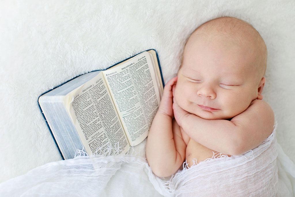 baby boy and bible in private studio