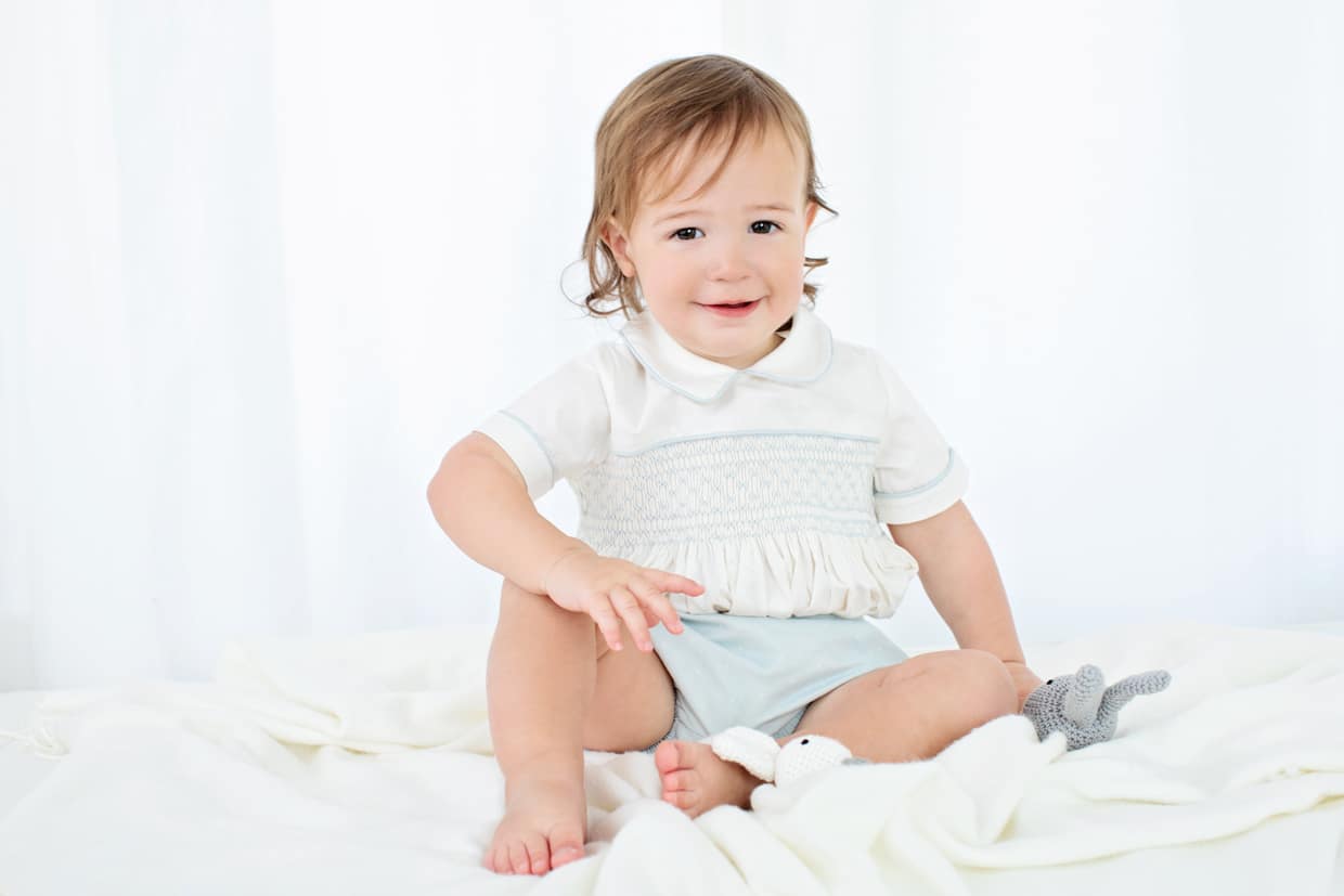 the most charming baby boy posing in private studio