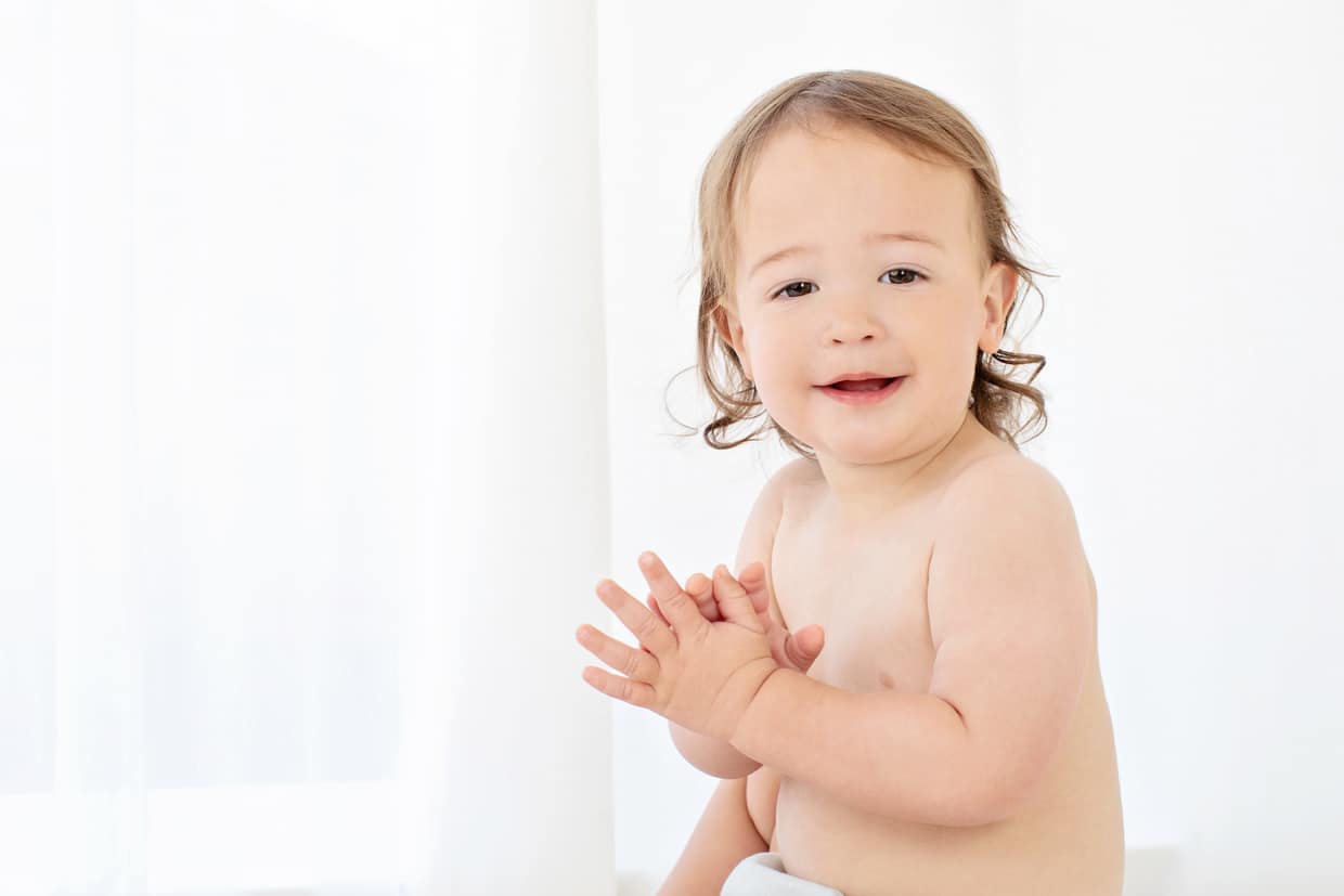 the most charming baby boy posing in private studio
