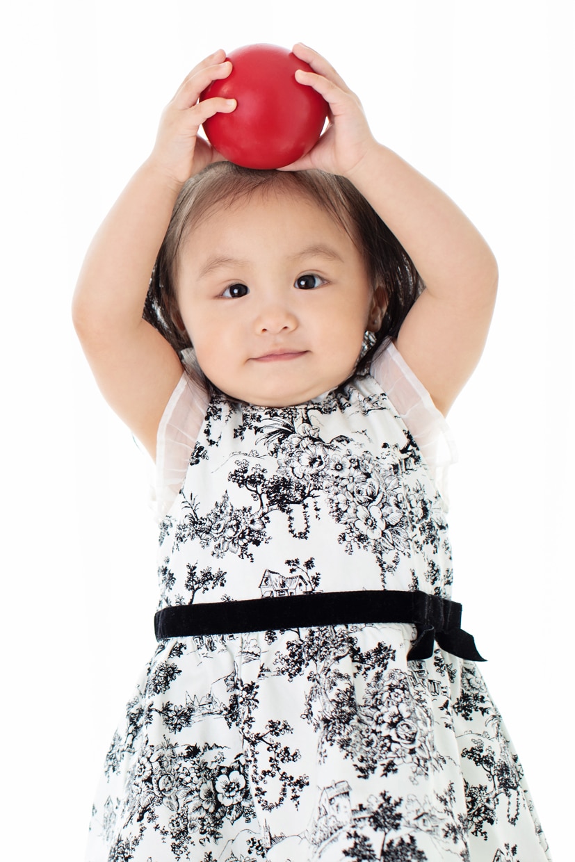 little angel posing in dallas studio session for holiday session