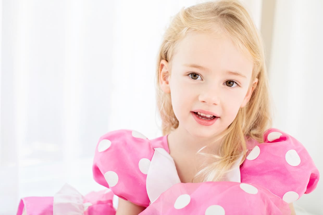 beautiful little girl posing for photos in dallas studio session