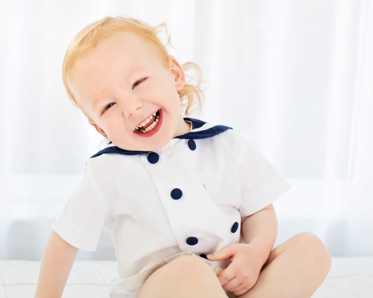 toddler boy laughing in dallas studio session