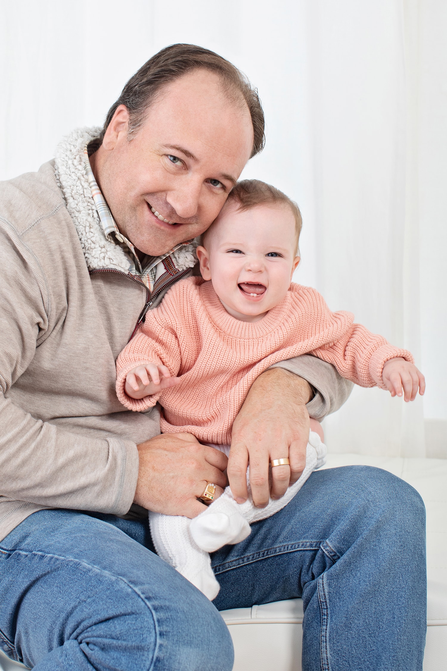 A dad with his child at Miette Photography.