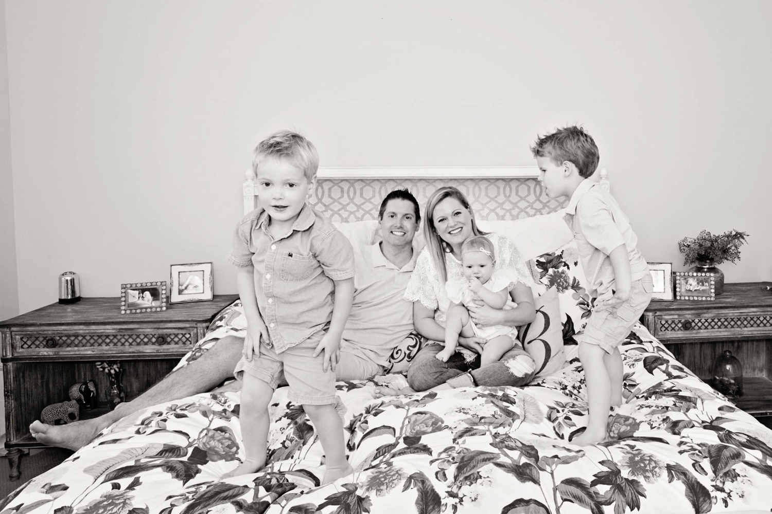 A family of five's photo is taken in their home.