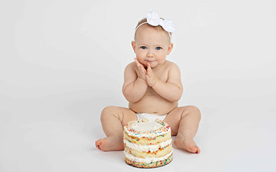 One Year Photo Shoot With Cake and This Baby Girl