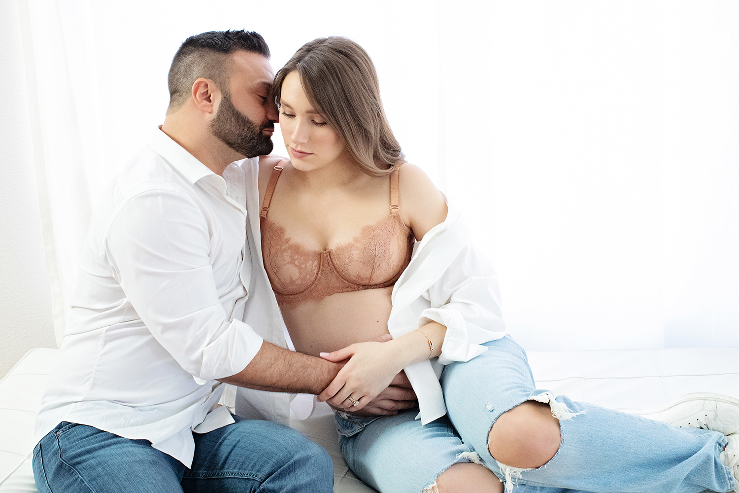 A maternity shoot with a couple.