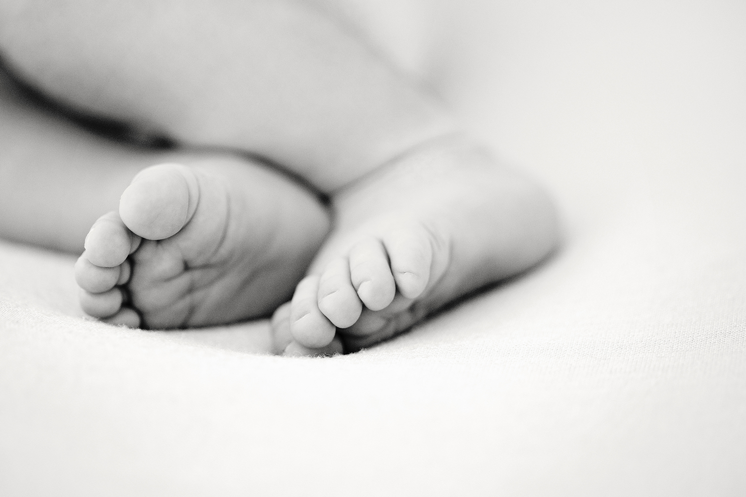 Photo of feet by best newborn photographers Dallas.