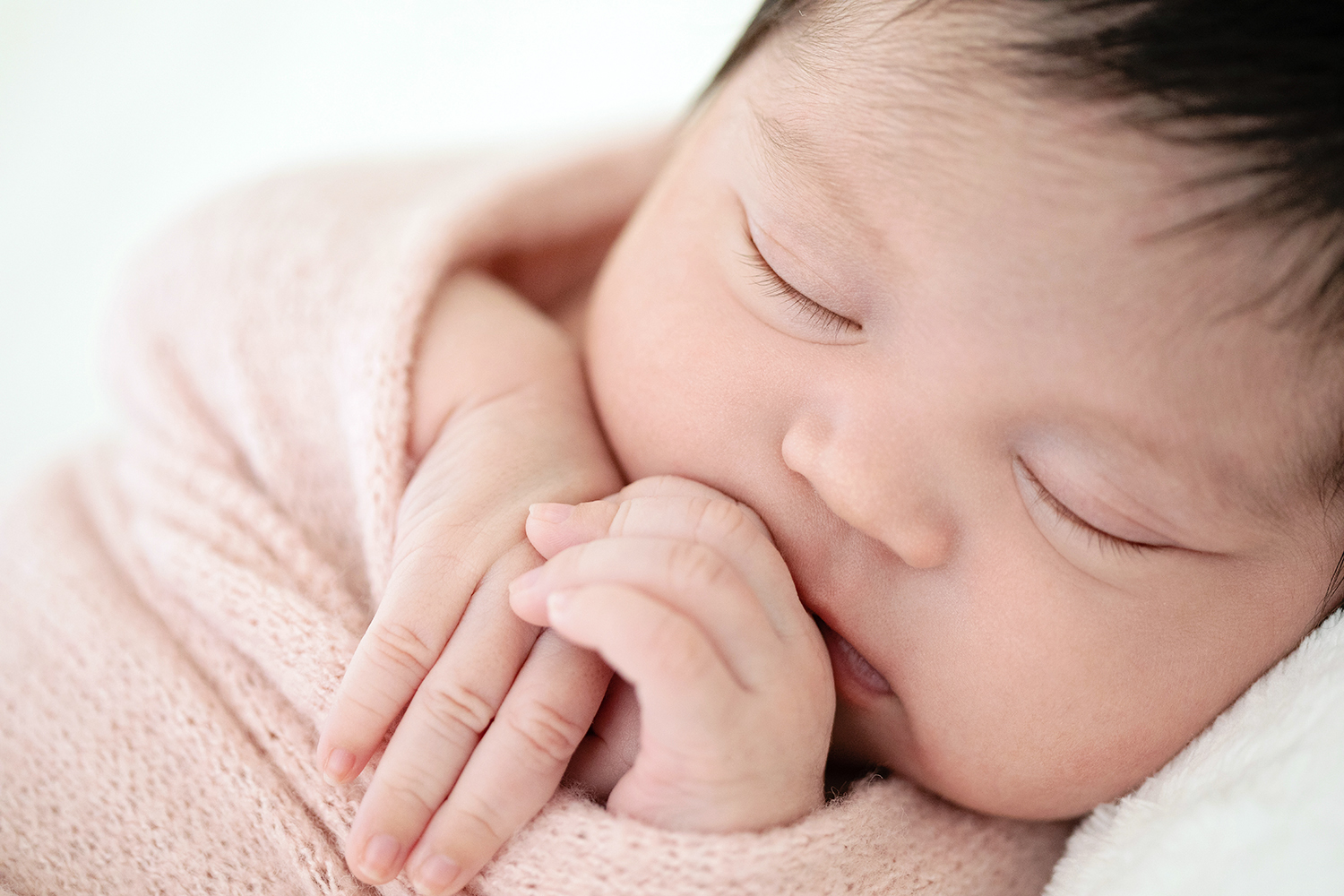 Photo of hands by best newborn photographers Dallas.