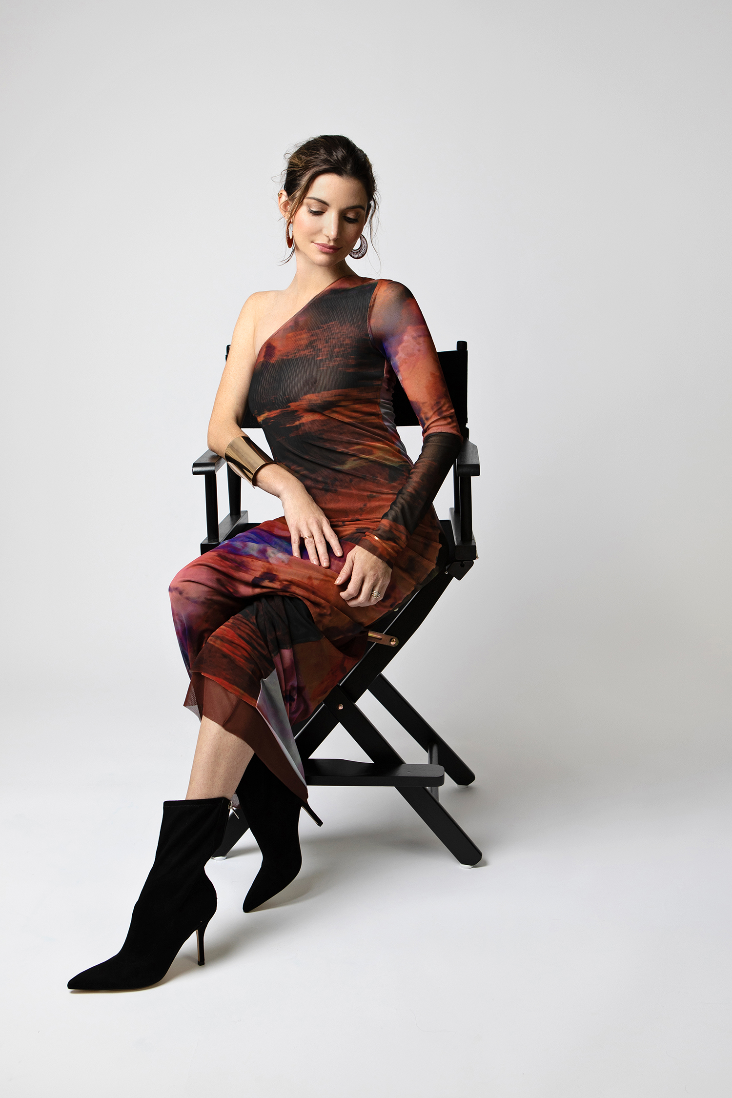 woman in dress in seated fashion portrait