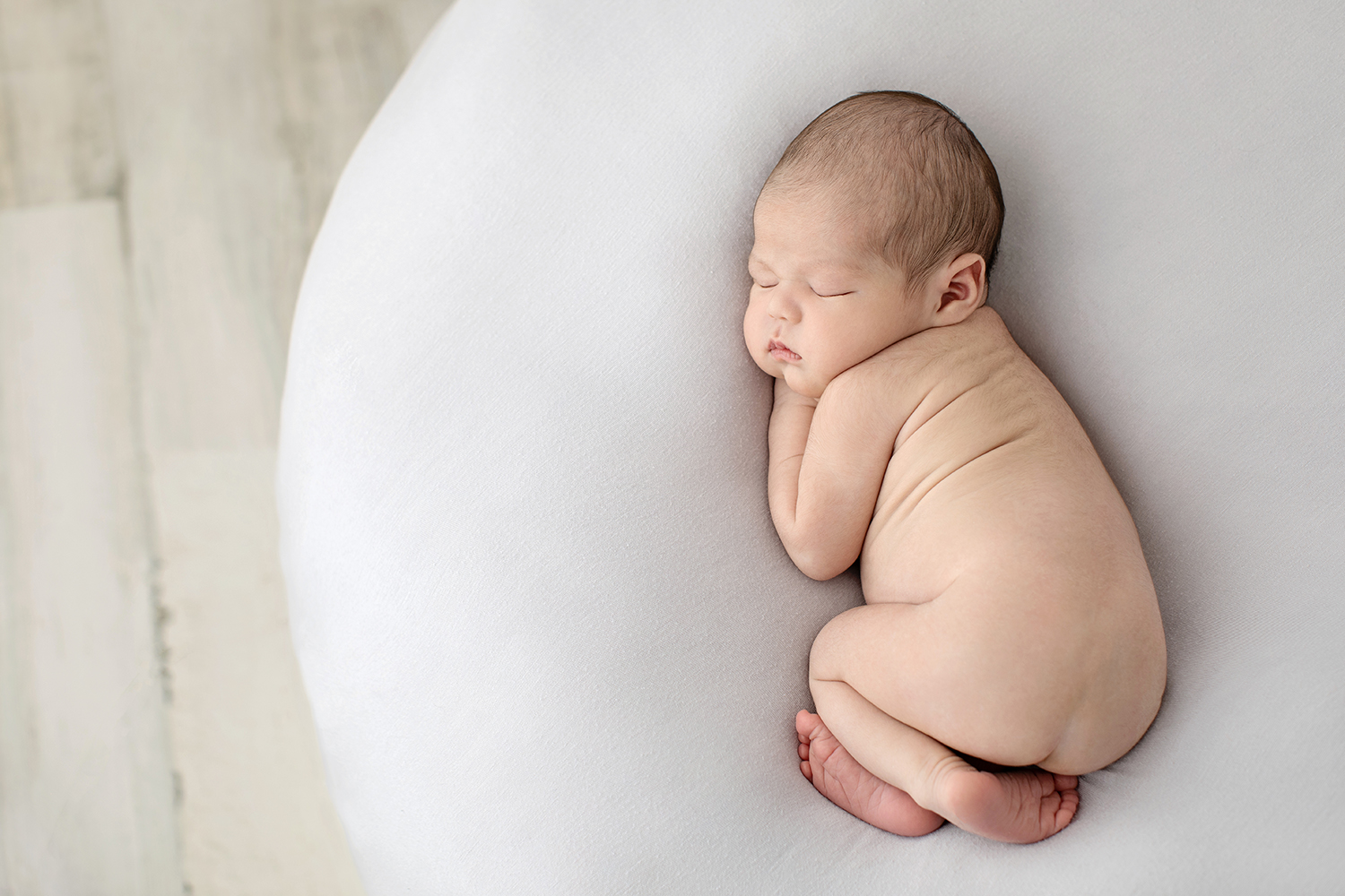 a sleeping newborn infant