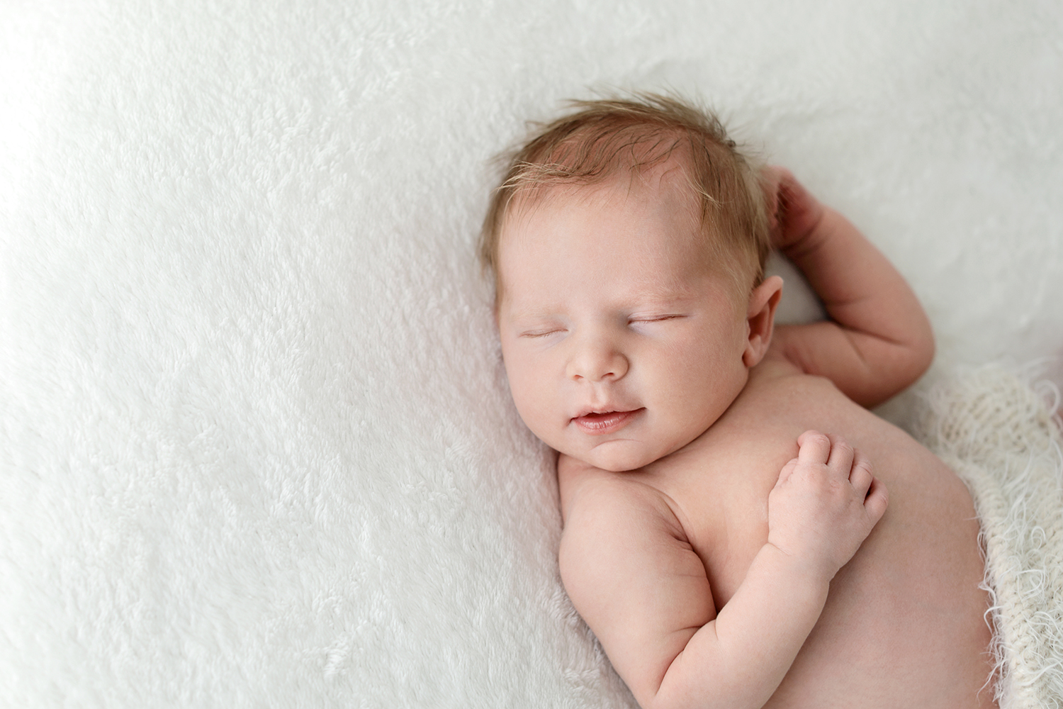 A baby's sweet face in soft, natural light