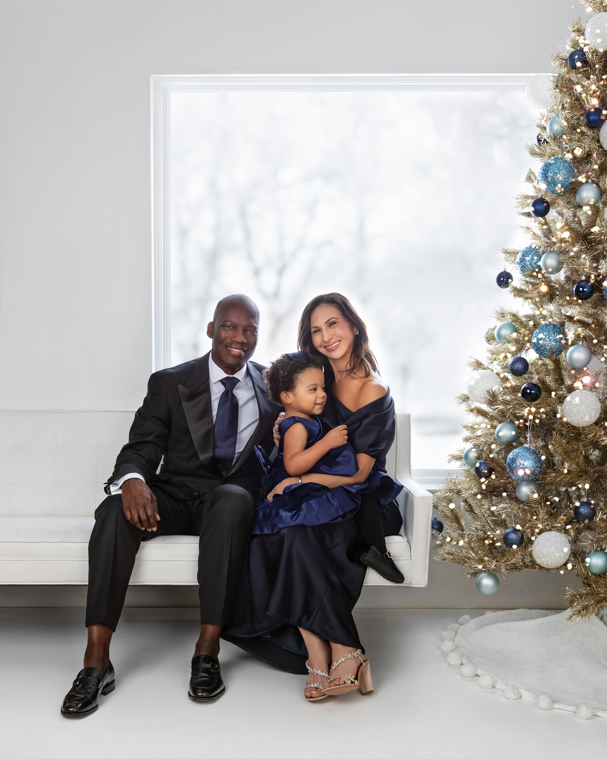 Family wearing formal clothes during a Dallas Christmas photoshoot