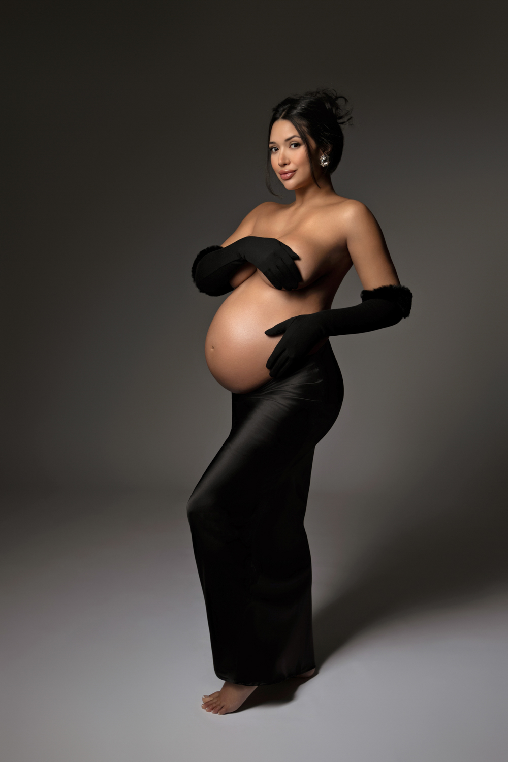 Elegant maternity photos with gloves Dallas photographer