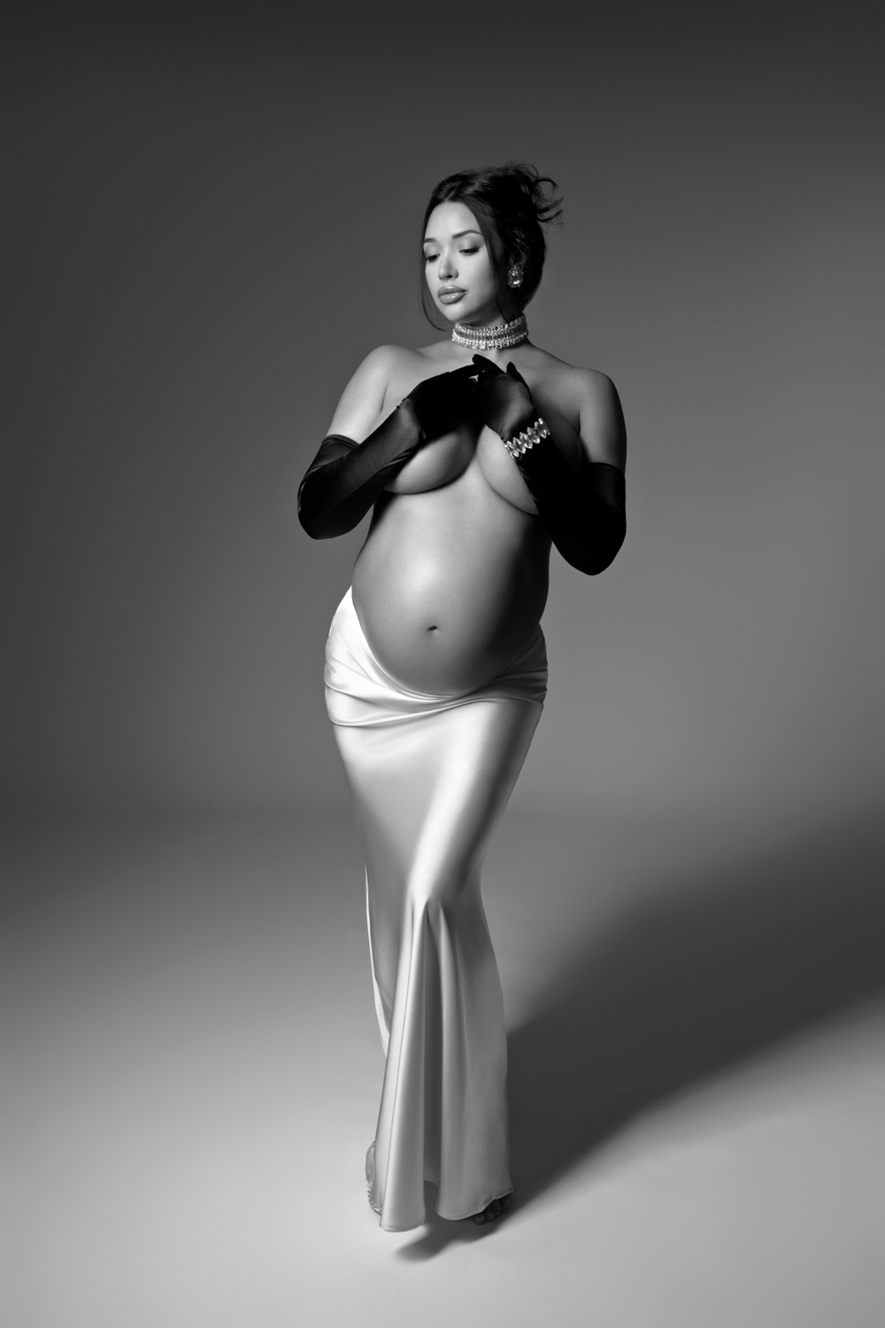 Elegant maternity photos with gloves Dallas photographer