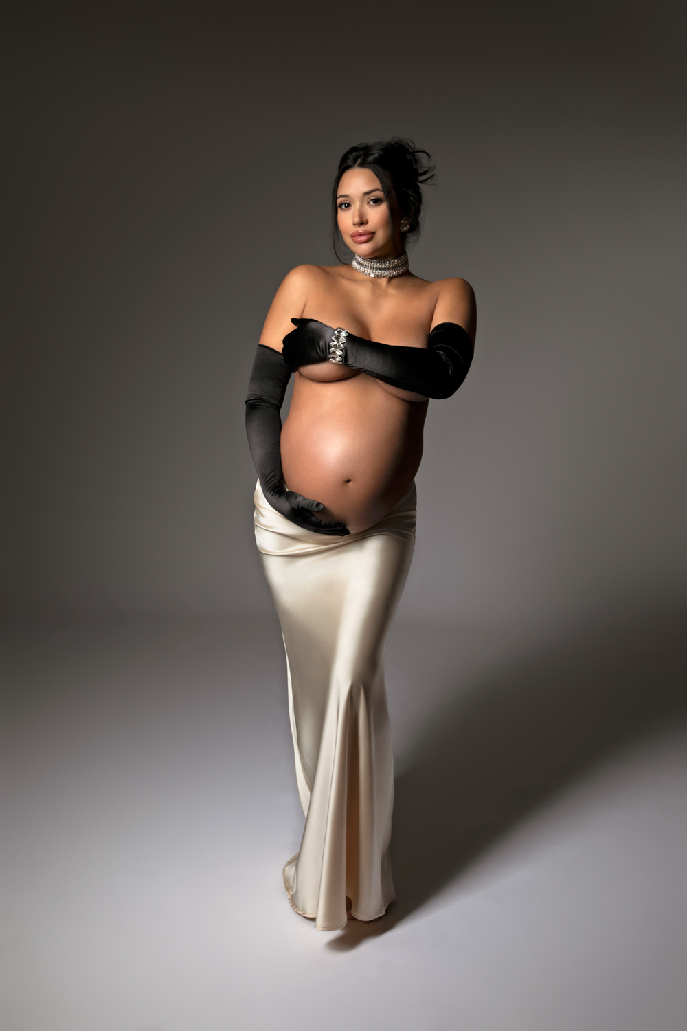 Elegant maternity photos with gloves Dallas photographer