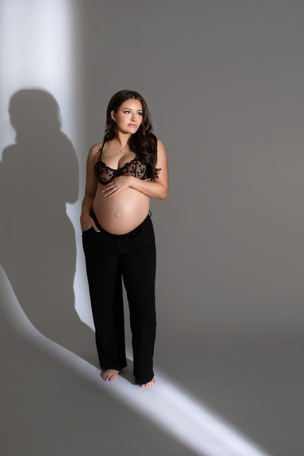 Pregnant woman in black lace bra photos Dallas photographer