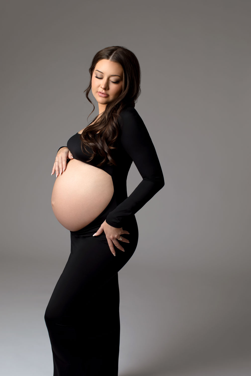 Elegant black dress maternity photos Dallas photographer