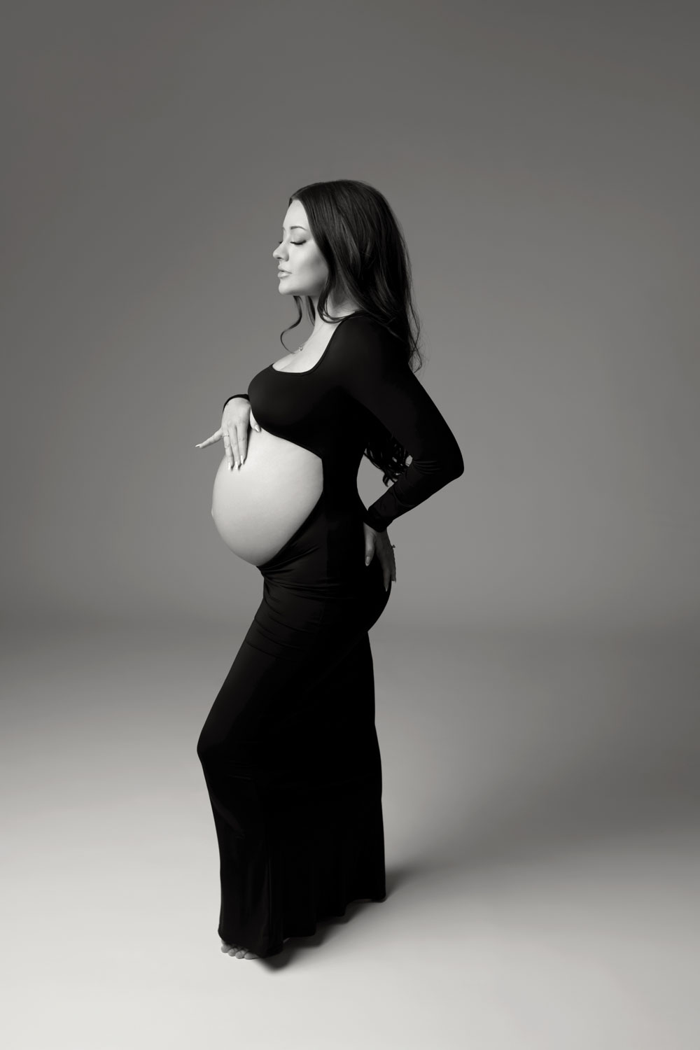 Elegant black dress maternity photos Dallas photographer