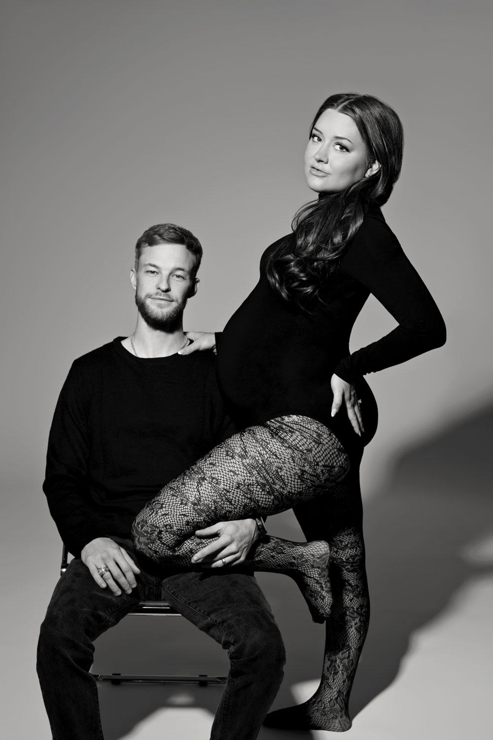 Husband and pregnant wife maternity session Dallas studio